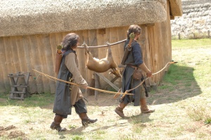 Rangers with dead deer